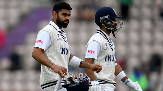 Virat Kohli and Ajinkya Rahane walk off the field after stumps on Day 2. (Getty Images)