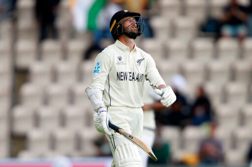 New Zealand's Devon Conway reacts as he walks off the field after losing his wicket. New Zealand's Devon Conway reacts as he walks off the field after losing his wicket.