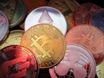Representations of cryptocurrencies including Bitcoin, Dash, Ethereum, Ripple and Litecoin.
