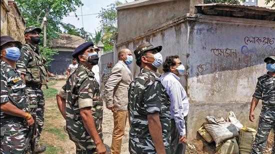 Birbhum: MHA team along with police personnel conduct investigation on post-poll violence in West Bengal, in Birbhum, on May 8, 2021 (PTI) Birbhum: MHA team along with police personnel conduct investigation on post-poll violence in West Bengal, in Birbhum, on May 8, 2021 (PTI)