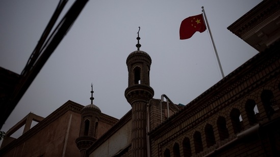 The Chinese national flag flies over a mosque in the old city in Kashgar, Xinjiang Uyghur Autonomous Region, China on May 4. Beijing denies accusations of genocide and says its policies in Xinjiang were necessary to stamp out separatists and religious extremists who plotted attacks and stirred up tensions between Uyghurs and Han, China's largest ethnic group, Reuters reported. (Thomas Peter / REUTERS) The Chinese national flag flies over a mosque in the old city in Kashgar, Xinjiang Uyghur Autonomous Region, China on May 4. Beijing denies accusations of genocide and says its policies in Xinjiang were necessary to stamp out separatists and religious extremists who plotted attacks and stirred up tensions between Uyghurs and Han, China's largest ethnic group, Reuters reported. (Thomas Peter / REUTERS)