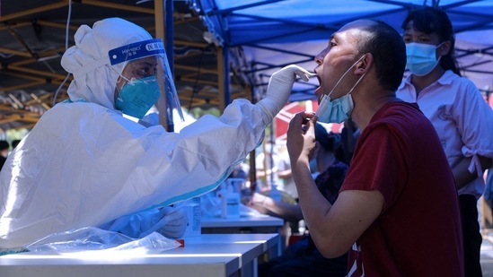 Dongguan launched its citywide testing programme following two cases reported since Friday. (AFP | Representational image) Dongguan launched its citywide testing programme following two cases reported since Friday. (AFP | Representational image)