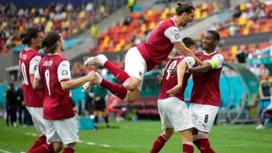 Austria's Christoph Baumgartner (9) celebrates after scoring his side's opening goal during the Euro 2020 soccer championship group C match between Ukraine and Austria at the National Arena stadium in Bucharest, Monday, June 21, 2021. (AP Photo/Vadim Ghirda) (AP) Austria's Christoph Baumgartner (9) celebrates after scoring his side's opening goal during the Euro 2020 soccer championship group C match between Ukraine and Austria at the National Arena stadium in Bucharest, Monday, June 21, 2021. (AP Photo/Vadim Ghirda) (AP)