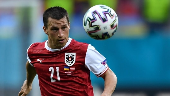 Austria's Stefan Lainer eyes the ball during the Euro 2020 soccer championship group C match between Ukraine and Austria at the National Arena stadium in Bucharest, Romania, Monday, June 21, 2021. (Daniel Mihailescu/Pool Photo via AP) (AP) Austria's Stefan Lainer eyes the ball during the Euro 2020 soccer championship group C match between Ukraine and Austria at the National Arena stadium in Bucharest, Romania, Monday, June 21, 2021. (Daniel Mihailescu/Pool Photo via AP) (AP)