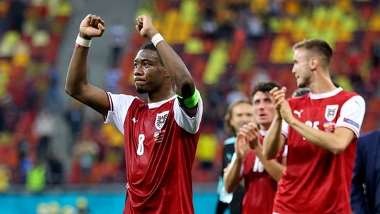Austria's David Alaba celebrates after the Euro 2020 soccer championship group C match between Ukraine and Austria at the National Arena stadium in Bucharest, Monday, June 21, 2021. (Marko Djurica/Pool via AP) (AP) Austria's David Alaba celebrates after the Euro 2020 soccer championship group C match between Ukraine and Austria at the National Arena stadium in Bucharest, Monday, June 21, 2021. (Marko Djurica/Pool via AP) (AP)