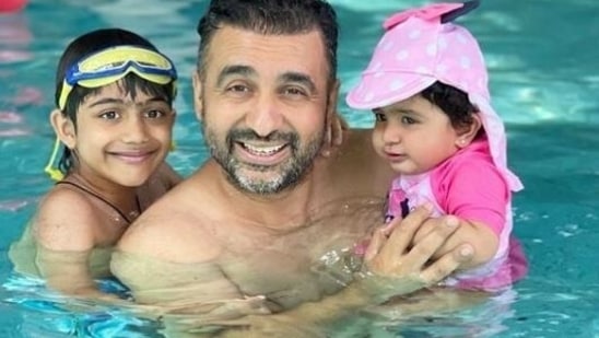 Shilpa Shetty's husband Raj Kundra poses with their children, Viaan and Samisha.