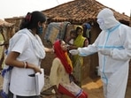 Health workers taking a nasal swab from a woman to test for Covid-19 infection in Jamsoti village, Uttar Pradesh on June 8. In Jamsoti, a village tucked deep inside India’s most populous state of Uttar Pradesh, the common refrain among the villagers is that the coronavirus spreads only in cities. The deadly infection, they believe, does not exist in villages, AP reported.