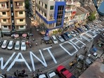 G7 leaders on Sunday strongly condemned the military coup in Myanmar and the subsequent violence committed by the security forces on civilians. In picture - Slogan written on a street as a protest in Yangon, Myanmar.