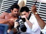 Hrithik Roshan and Dabboo Ratnani discuss a shot.