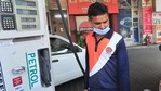 File photo: A fuel station attendant at a petrol station. (Ravi Kumar/Hindustan Times) File photo: A fuel station attendant at a petrol station. (Ravi Kumar/Hindustan Times)