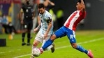 Argentina's Lionel Messi and Paraguay Santiago Arzamendia battle for the ball during a Copa America soccer match(AP) Argentina's Lionel Messi and Paraguay Santiago Arzamendia battle for the ball during a Copa America soccer match(AP)