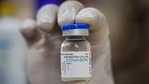 A health worker holding up a vial of Covaxin, a Covid-19 vaccine at a school being used as a vaccination site in Kingsway Camp, Delhi (Sanchit Khanna / HT PHOTO), A health worker holding up a vial of Covaxin, a Covid-19 vaccine at a school being used as a vaccination site in Kingsway Camp, Delhi (Sanchit Khanna / HT PHOTO),