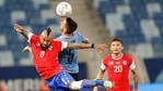 Uruguay's Matias Vecino and Chile's Arturo Vidal go for a header during a Copa America soccer match(AP) Uruguay's Matias Vecino and Chile's Arturo Vidal go for a header during a Copa America soccer match(AP)