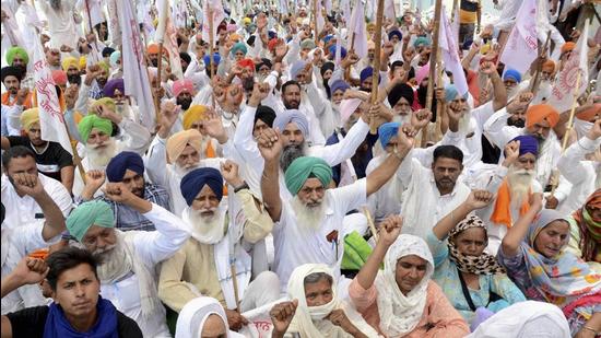 Members of various farmers organisations protest against the three farm laws, near BJP office in Amritsar on June 5. (File photo) Members of various farmers organisations protest against the three farm laws, near BJP office in Amritsar on June 5. (File photo)
