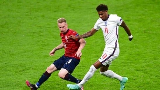 England's Marcus Rashford, right, and Czech Republic's Petr Sevcik battle for the ball during the Euro 2020 soccer championship group D match between the Czech Republic and England at Wembley stadium, London, Tuesday, June 22, 2021. (Neil Hall/Pool Photo via AP)(AP)