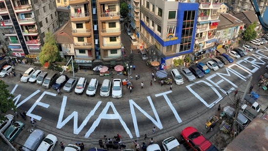 G7 leaders on Sunday strongly condemned the military coup in Myanmar and the subsequent violence committed by the security forces on civilians. In picture - Slogan written on a street as a protest in Yangon, Myanmar.(Reuters)