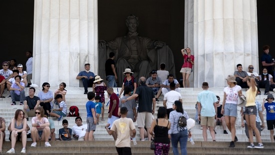 Visitors gather at the Lincoln Memorial in Washington, DC, US, on Sunday, June 20, 2021.(Bloomberg) Visitors gather at the Lincoln Memorial in Washington, DC, US, on Sunday, June 20, 2021.(Bloomberg)