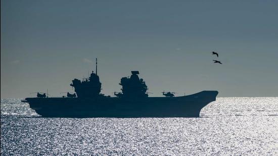 The HMS Queen Elizabeth. The officer’s induction comes weeks after the UK’s largest warship and its strike task group embarked upon its maiden voyage that will bring it to the Indian Ocean and the South China Sea. (File photo) The HMS Queen Elizabeth. The officer’s induction comes weeks after the UK’s largest warship and its strike task group embarked upon its maiden voyage that will bring it to the Indian Ocean and the South China Sea. (File photo)