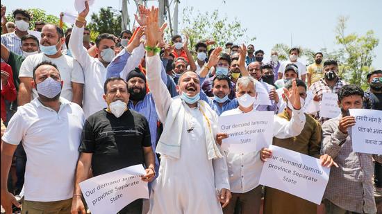 Former MLA Balwant Singh Mankotia along with supporters stages a protest demanding creation of Jammu as a separate state, in Jammu on Tuesday. (PTI) Former MLA Balwant Singh Mankotia along with supporters stages a protest demanding creation of Jammu as a separate state, in Jammu on Tuesday. (PTI)