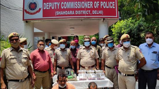 Police team with the arrested men in New Delhi on Tuesday, June 22. (Karn Pratap Singh) Police team with the arrested men in New Delhi on Tuesday, June 22. (Karn Pratap Singh)