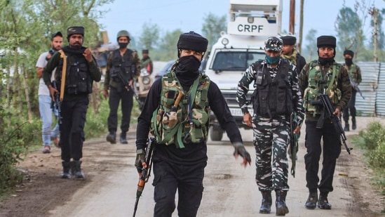 Security forces personnel are seen in Sopore, where three terrorists were killed in an encounter on Monday. (PTI Photo) Security forces personnel are seen in Sopore, where three terrorists were killed in an encounter on Monday. (PTI Photo)