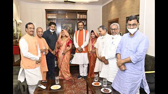 Chief Minister Yogi Adityanath at deputy chief minister Keshav Prasad Maurya’s residence ostensibly to bless Keshav’s son and daughter in law who got married recently. Deputy chief minister Dinesh Sharma & two senior RSS leaders Dattatreya Hosbale and Krishna Gopal are also seen. (HT PHOTO) Chief Minister Yogi Adityanath at deputy chief minister Keshav Prasad Maurya’s residence ostensibly to bless Keshav’s son and daughter in law who got married recently. Deputy chief minister Dinesh Sharma & two senior RSS leaders Dattatreya Hosbale and Krishna Gopal are also seen. (HT PHOTO)