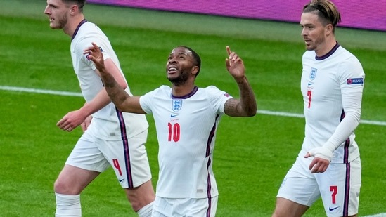 England's Raheem Sterling, centre, reacts after scoring his team's first goal during the Euro 2020 soccer championship group D match between the Czech Republic and England at Wembley stadium, London, Tuesday, June 22, 2021. (AP Photo/Matt Dunham,Pool)(AP)