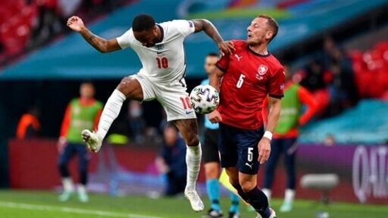 England's Raheem Sterling vies for the ball with Czech Republic's Vladimir Coufal, right, during the Euro 2020 soccer championship group D match between the Czech Republic and England at Wembley stadium in London, Tuesday, June 22, 2021. (Justin Tallis, Pool photo via AP)(AP)