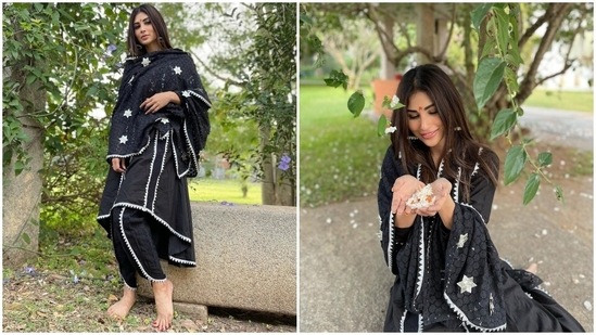 Nailing the ethnic look, Mouni here wore a simple high-low kurti with dhoti pants replete with white gota patti borders. She draped an embroidered dupatta over her shoulders to complete the ethnic look.(Instagram/@imouniroy)