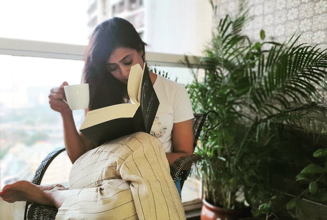 Shweta Tiwari engrossed in her book.