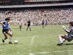 Argentinian forward Diego Armando Maradona (3rd L) runs past English defender Terry Butcher (L) on his way to dribbling goalkeeper Peter Shilton (R) and scoring his second goal, or goal of the century, during the World Cup quarterfinal soccer match between Argentina and England on June 22, 1986 in Mexico City.(AFP) Argentinian forward Diego Armando Maradona (3rd L) runs past English defender Terry Butcher (L) on his way to dribbling goalkeeper Peter Shilton (R) and scoring his second goal, or goal of the century, during the World Cup quarterfinal soccer match between Argentina and England on June 22, 1986 in Mexico City.(AFP)