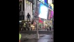 The image shows the man riding a drone-like structure and gliding across Times Square.(Twitter/@rex_chapman) The image shows the man riding a drone-like structure and gliding across Times Square.(Twitter/@rex_chapman)