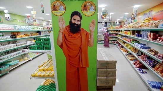 Yoga guru Ramdev on Wednesday moved the Supreme Court challenging multiple first information reports (FIRs) against him for his comments on efficacy of allopathy in treatment of the coronavirus disease (Covid-19).(REUTERS) Yoga guru Ramdev on Wednesday moved the Supreme Court challenging multiple first information reports (FIRs) against him for his comments on efficacy of allopathy in treatment of the coronavirus disease (Covid-19).(REUTERS)
