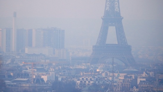 The Eiffel Tower is surrounded by a small-particle haze which hangs above the skyline in Paris, France.(Reuters/ File photo)