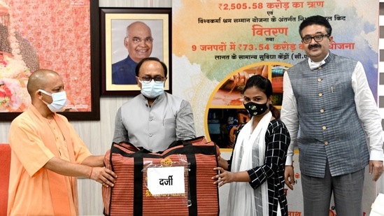 Uttar Pradesh Chief Minister Yogi Adityanath distributes loans and tool kits to beneficiaries during an online swarozgar Sangam at his official residence in Lucknow. (ANI Photo) Uttar Pradesh Chief Minister Yogi Adityanath distributes loans and tool kits to beneficiaries during an online swarozgar Sangam at his official residence in Lucknow. (ANI Photo)