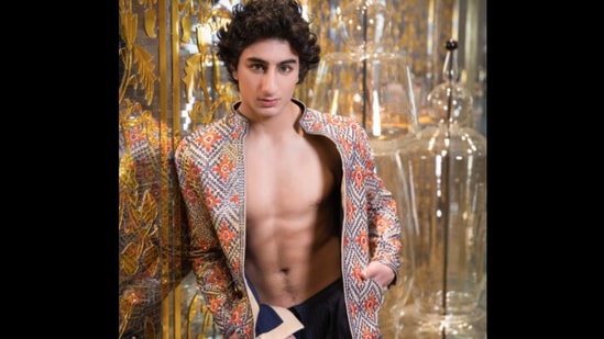 Ibrahim Ali Khan: Saif Ali Khan and Amrita Singh's younger son Ibrahim Ali Khan is redefining fashion with his take on Indian wear. In one of his photoshoots with famous designer duo Abu Jani and Sandeep Khosla, the 20-year-old was seen wearing a Patola mirror front open jacket embroidered in mirror and resham threads.(Facebook/@AbuJaniSandeepKhosla)
