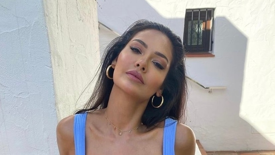 Esha Gupta has shared this picture in a blue tank top.