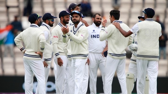 India's Mohammed Shami, third right, and teammates celebrate the dismissal of New Zealand's Ross Taylor.(AP) India's Mohammed Shami, third right, and teammates celebrate the dismissal of New Zealand's Ross Taylor.(AP)