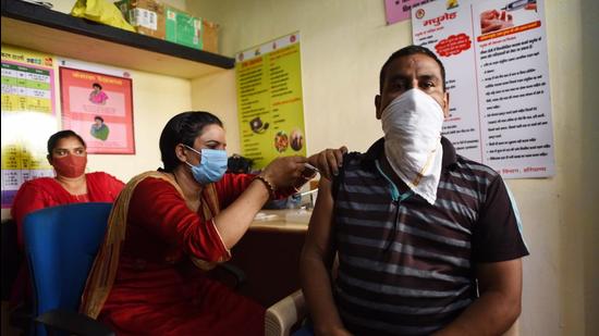 As per the data, of 1,056, 946 people who have been vaccinated with at least one dose in the district till now, 650, 749 are men. (Vipin Kumar /HT PHOTO) As per the data, of 1,056, 946 people who have been vaccinated with at least one dose in the district till now, 650, 749 are men. (Vipin Kumar /HT PHOTO)
