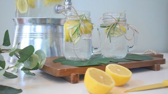 Lemon water: Having this refreshing drink is a good way of starting your day. Lemon contains antioxidants and pectin fibre, which helps in melting belly fat. Take a glass of water, add some lemon juice and a teaspoon of honey. Drink this on an empty stomach every day to see positive results. (Unsplash) Lemon water: Having this refreshing drink is a good way of starting your day. Lemon contains antioxidants and pectin fibre, which helps in melting belly fat. Take a glass of water, add some lemon juice and a teaspoon of honey. Drink this on an empty stomach every day to see positive results. (Unsplash)