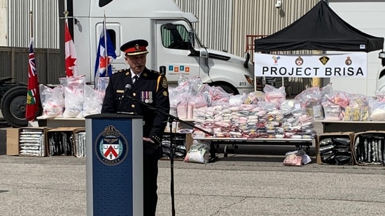 Toronto Police chief James Ramer addresses a press conference with the seized drug in the background.(Twitter/@jamesramertps)