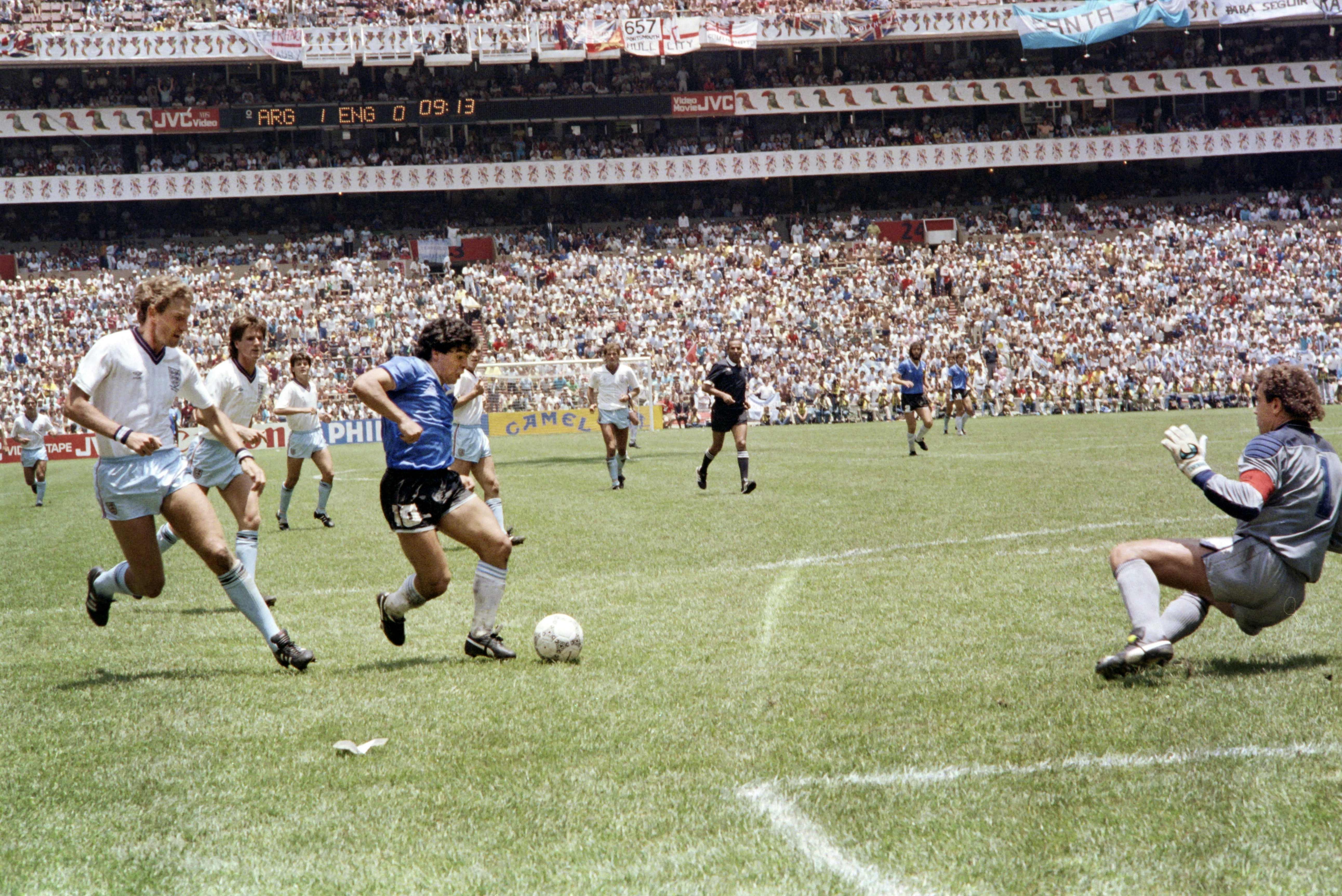 Diego Armando Maradona scoring goal of the century during the World Cup quarterfinal between Argentina and England. (AFP)