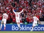 Denmark's Mikkel Damsgaard celebrates with teammates