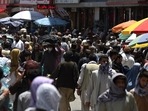 US intelligence and military analysts have since revised their assessment and now believe that Kabul could fall in six to 12 months after the departure of American troops. In picture - A crowded market in Kabul.
