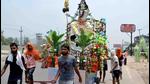 A Lord Shiva statue being ferried by Kanwariyas in Haridwar after fetching water from Ganga. (HT file) A Lord Shiva statue being ferried by Kanwariyas in Haridwar after fetching water from Ganga. (HT file)