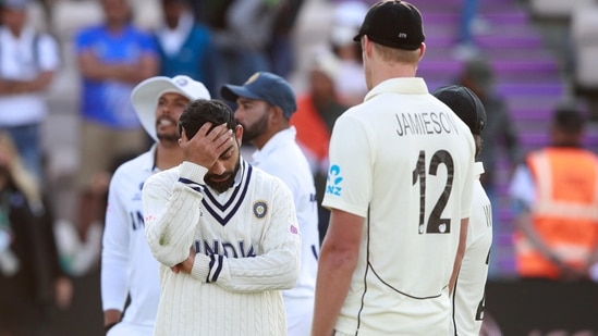 India's captain Virat Kohli, left, attends the presentation ceremony after New Zealand won the World Test Championship final cricket match, at the Rose Bowl in Southampton, England, Wednesday, June 23, 2021.(AP)