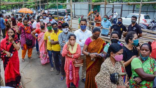 Beneficiaries wait for their dose of Covid-19 vaccine at a vaccination centre in Thane, Maharashtra, on Wednesday, June 23. (PTI) Beneficiaries wait for their dose of Covid-19 vaccine at a vaccination centre in Thane, Maharashtra, on Wednesday, June 23. (PTI)
