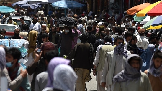 US intelligence and military analysts have since revised their assessment and now believe that Kabul could fall in six to 12 months after the departure of American troops. In picture - A crowded market in Kabul.(AFP)