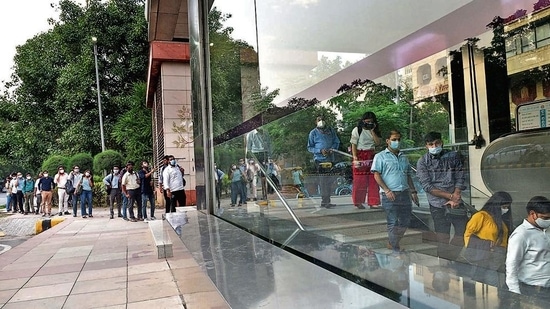 Long queues, like the one at Janpath Metro station, have become a common sight ever since the Metro resumed operations on June 7. (HT Photo) Long queues, like the one at Janpath Metro station, have become a common sight ever since the Metro resumed operations on June 7. (HT Photo)