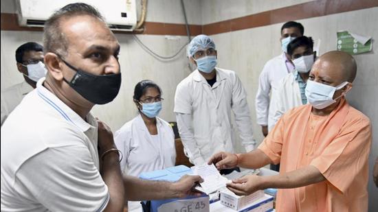 Uttar Pradesh chief minister Yogi Adityanath at a vaccination centre in Lucknow. (PTI FILE PHOTO) Uttar Pradesh chief minister Yogi Adityanath at a vaccination centre in Lucknow. (PTI FILE PHOTO)